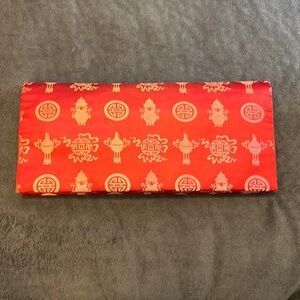 Vintage Japanese clutch. Comes with vintage pigeon lighter, mirror and wallet.